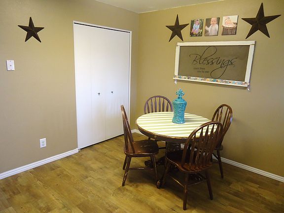 LARGE pantry behind nice white bi-fold pantry doors