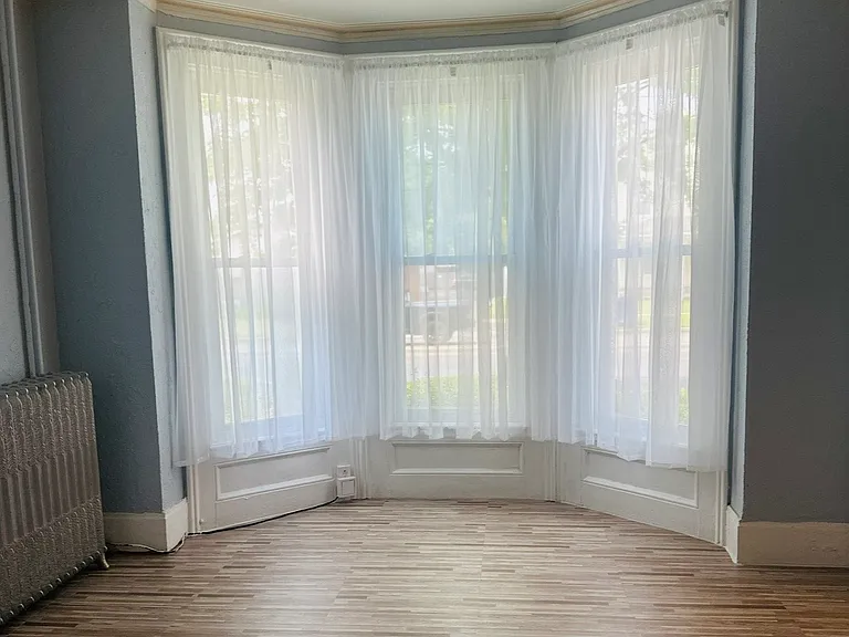 Living Room, Bay Windows with Recessed Lighting