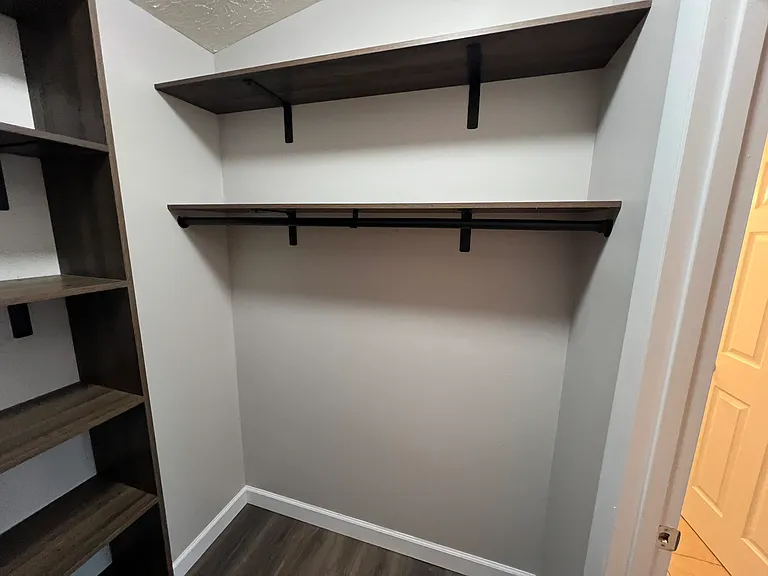 Main Bedroom Walk-In Closet View 3