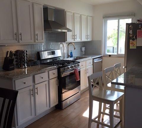 Updated kitchen with granite countertops and updated stainless steel appliances