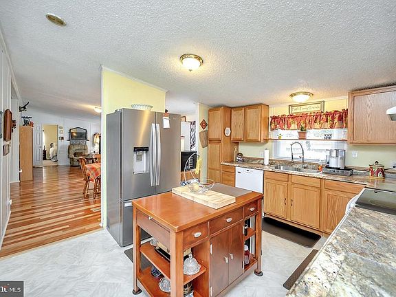 Kitchen with newer appliances.