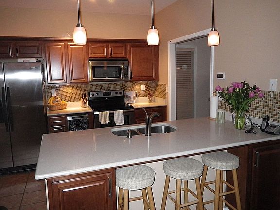 Updated Kitchen with Stone, Stainless