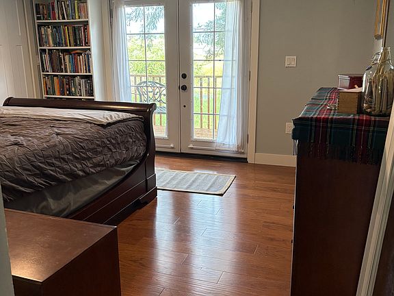 Primary bedroom with deck.