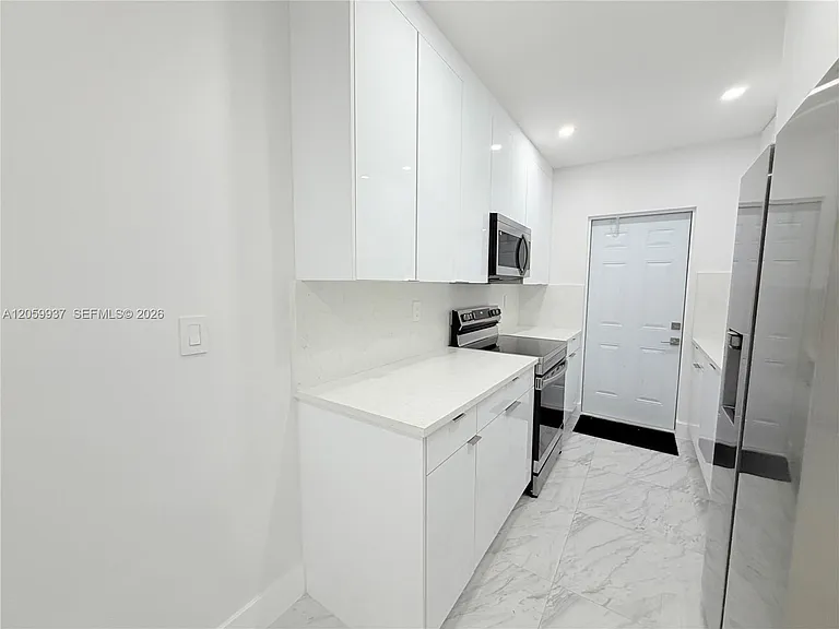 3390 NW 50th St #3390 — Photo 8