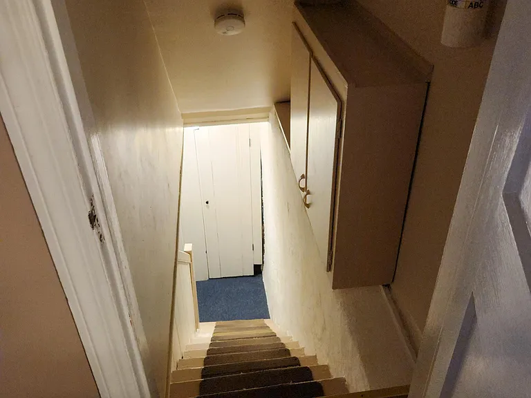 Steps to basement from kitchen