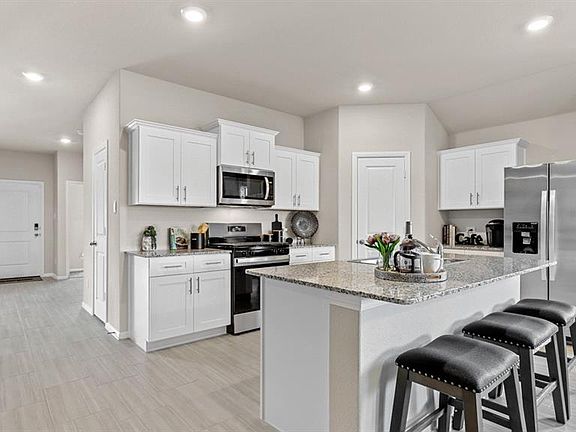 Kitchen - All Home and community information, including pricing, included features, terms, availability and amenities, are subject to change at any time without notice or obligation. All Drawings, pictures, photographs, video, square footages, floor plans, elevations, features, colors and sizes are approximate for illustration purposes only and will vary from the homes as built.
