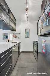 Sold by One Irving Place Realty