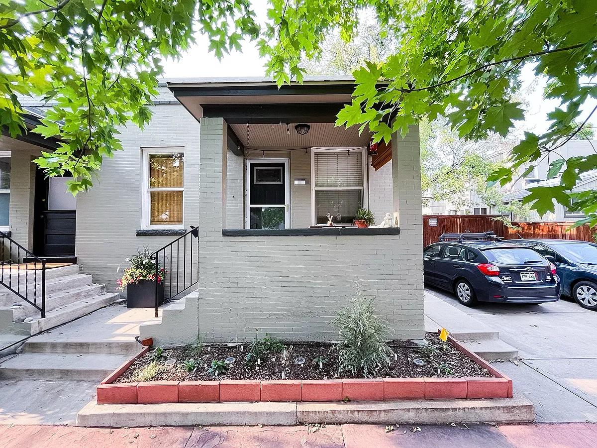 Front of home, private front porch, reserved parking spot - 523 E 2nd Ave