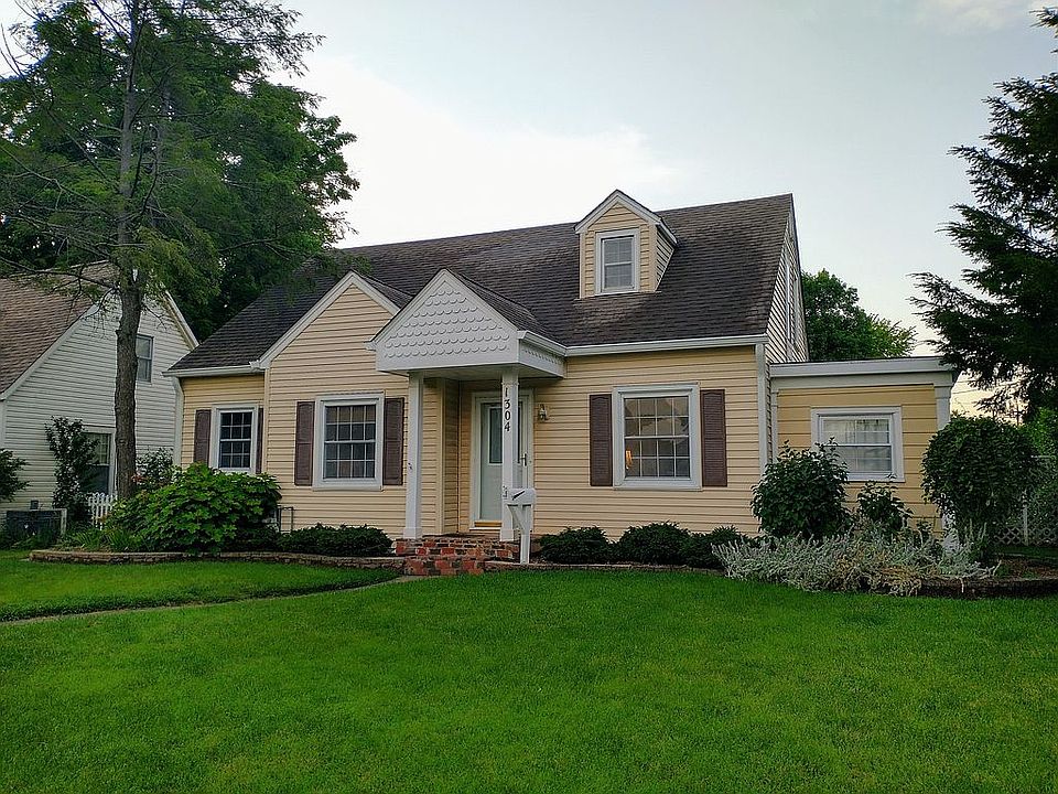Front of house with sunroom