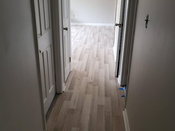 Hall way to 3 of the 4 bedrroms