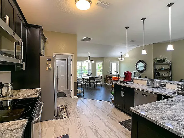 Kitchen looking into dining room and front of house