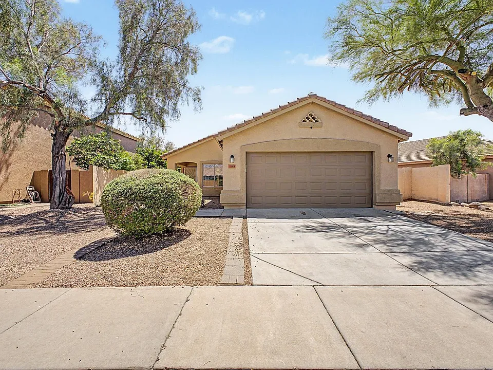 7043 W Phelps Rd