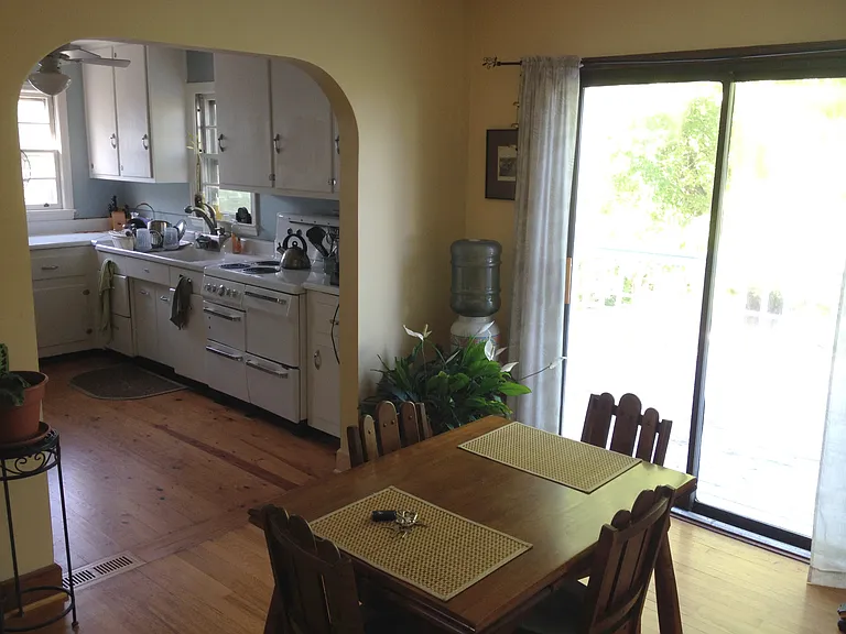 Dining room with sliding glass door to deck
