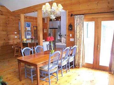 dining area with doors to deck