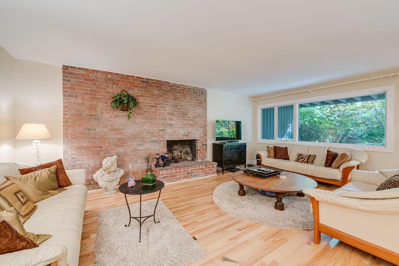  living room with wood-burning fireplace