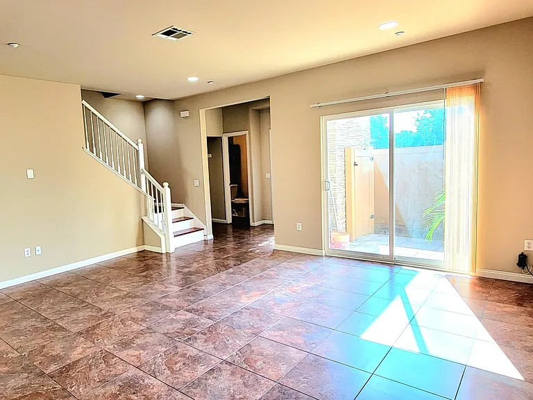 Living room area facing patio