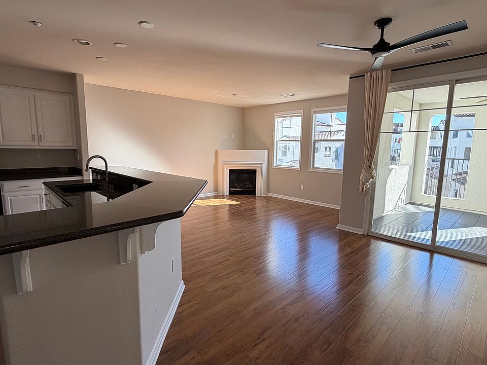 Sun-drenched living room with bright, south-facing windows.