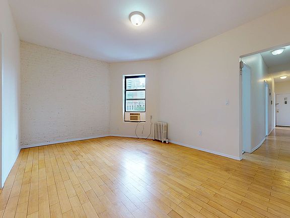 5th image of 229 E 12th St APT 71