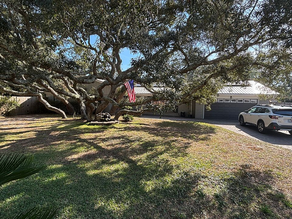 Large oak trees throughout property