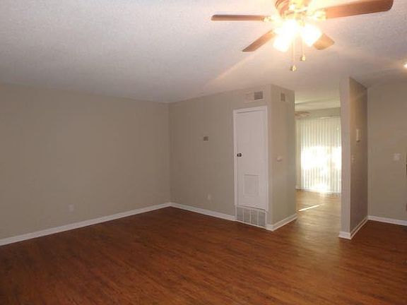 Living area looking into the bedroom.