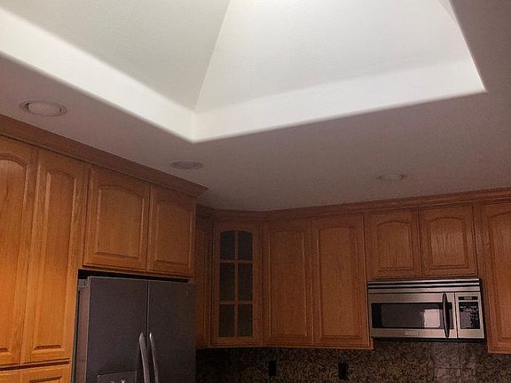 Skylight in kitchen for lots of natural lighting. Also under countertop lighting that can be turned on.
