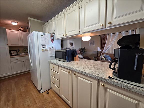 3rd image of 4157 71ST LANE N #14