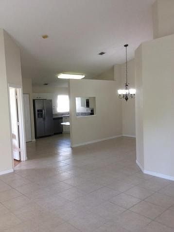 VAULTED CEILINGS, COVE SHELVING, HIGH HAT LIGHTS
