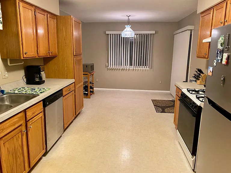 Kitchen - with walkout to large deck.