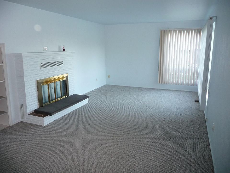 The livingroom is good sized and large windows let in a lot of light.