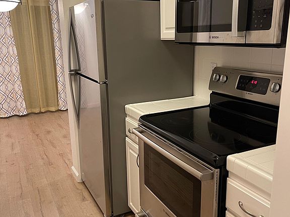 Kitchen with newer appliances.