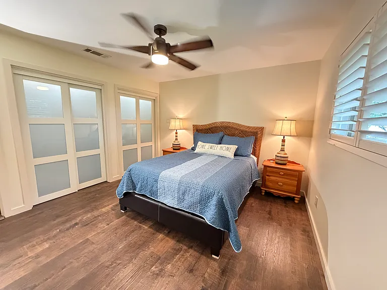 Bedroom 1 with queen size bed and double closets