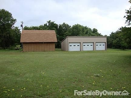 Barn and Garage
						:
						20 x 40 3-bay shop and a 20 x 30 barn. Both have concrete floors & electricity.