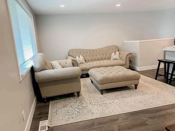 To the right (not seen here) is the kitchen.