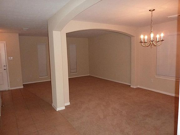 Open-plan formal living and dining rooms