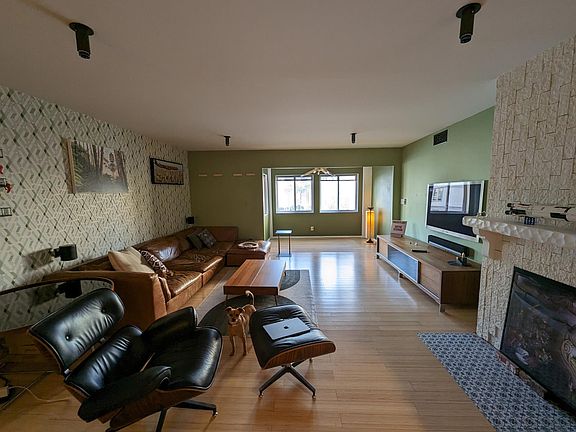 Living Room, eames lounge chair (knockoff), and outman couch (real deal!)