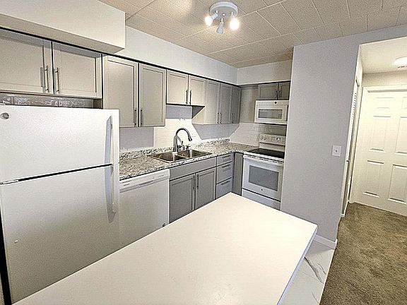 Beautiful Newly renovated Fully equip. Kitchen w/ eat at island, new tile flooring, new cabinets, new countertops.