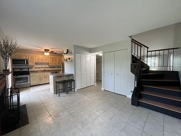 Open concept living with kitchen that flows in to dining room