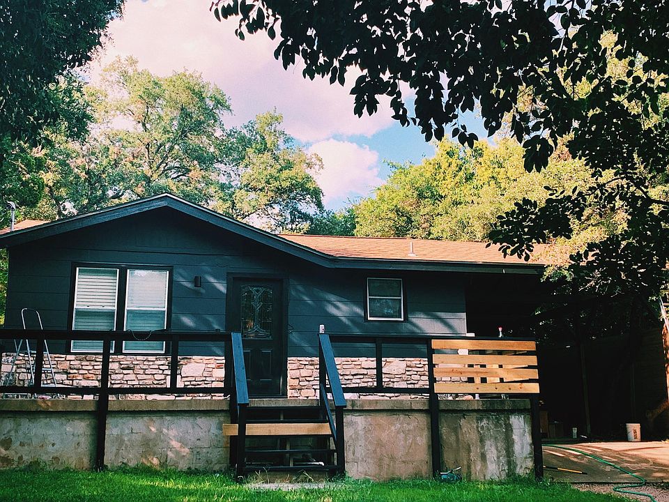 Front of House (Railing installation progress photo - railing is now complete)