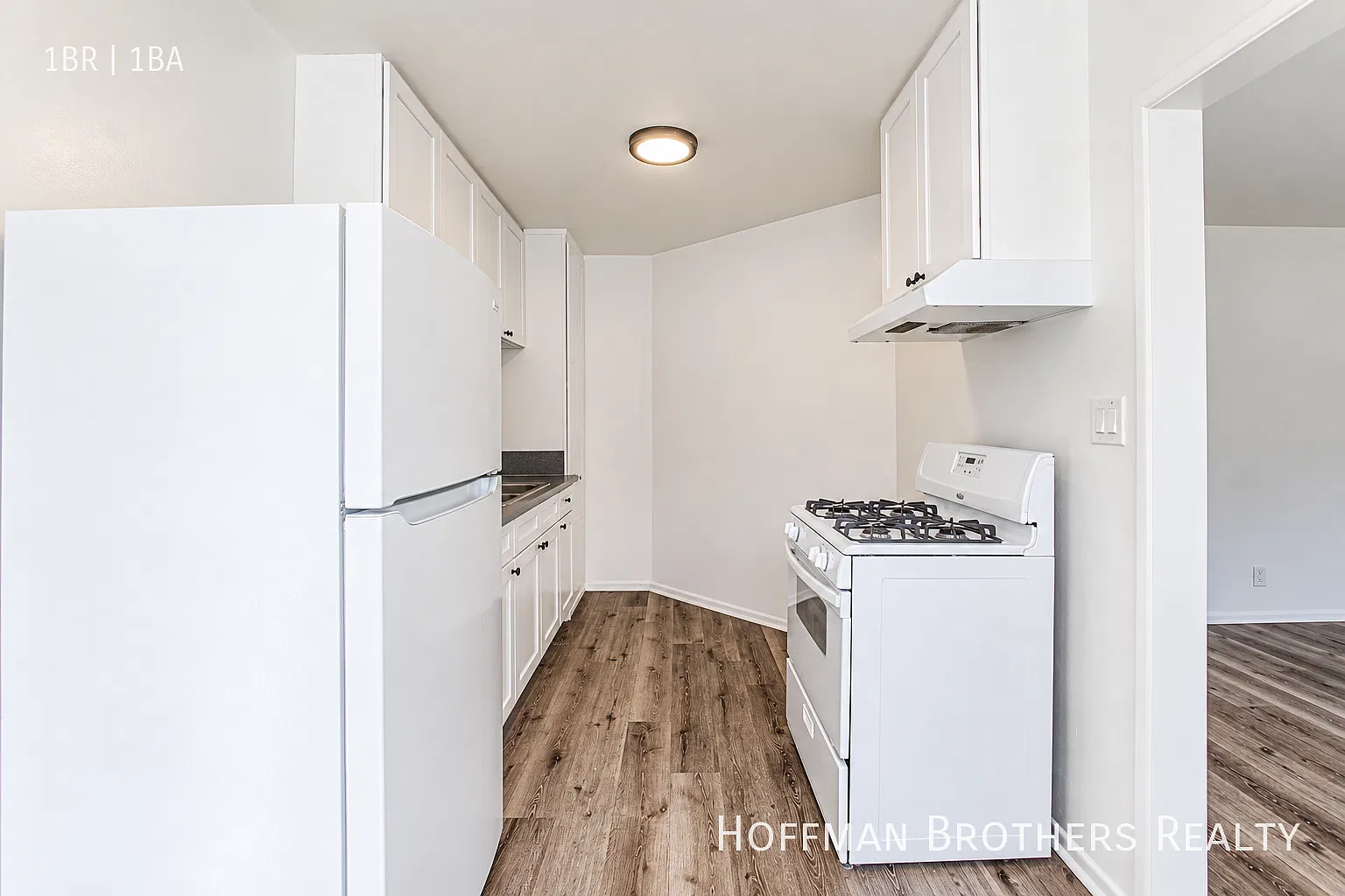 **1 Month Free**Updated 1 Bedroom with Hardwood-Style Floors & Water Included Near West Carson! — Photo 2