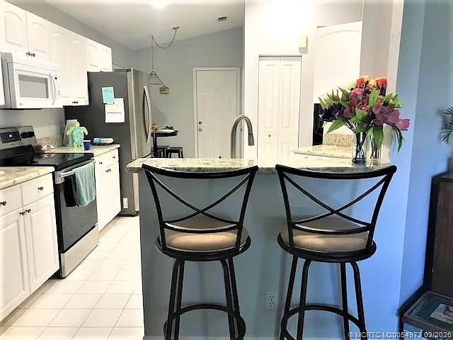 3486 SW Pindo Palm Ln — Photo 7
