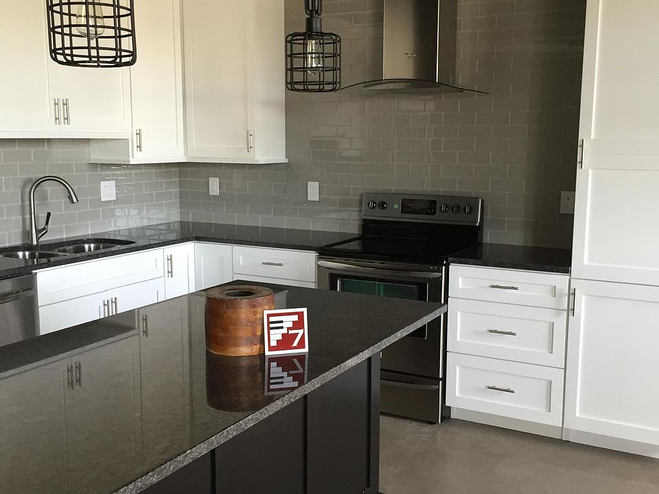 Custom kitchen. Granite island.