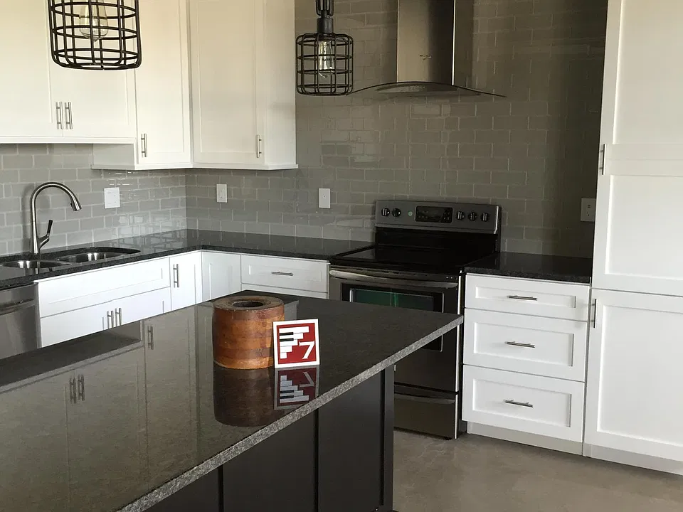 Custom kitchen. Granite island.