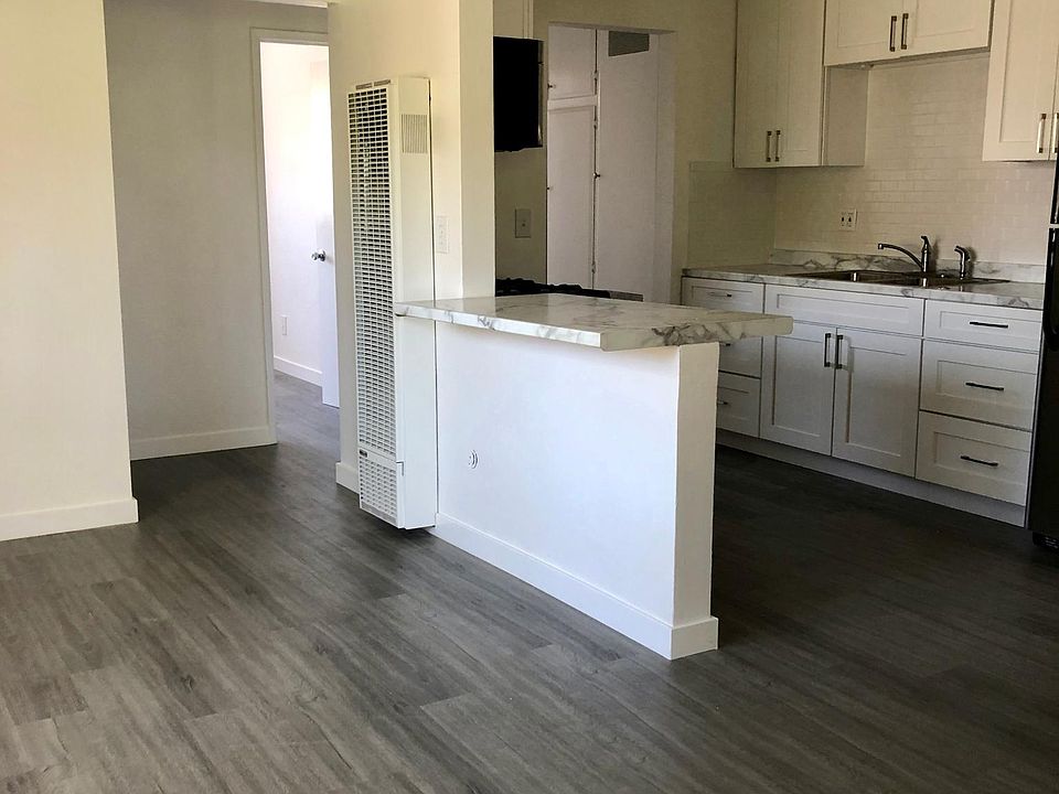 Open floor plan with a cute island perfect for stools and company.