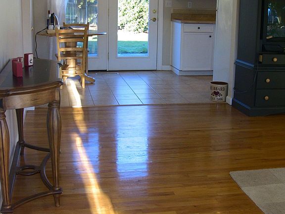Part of living room going into kitchen