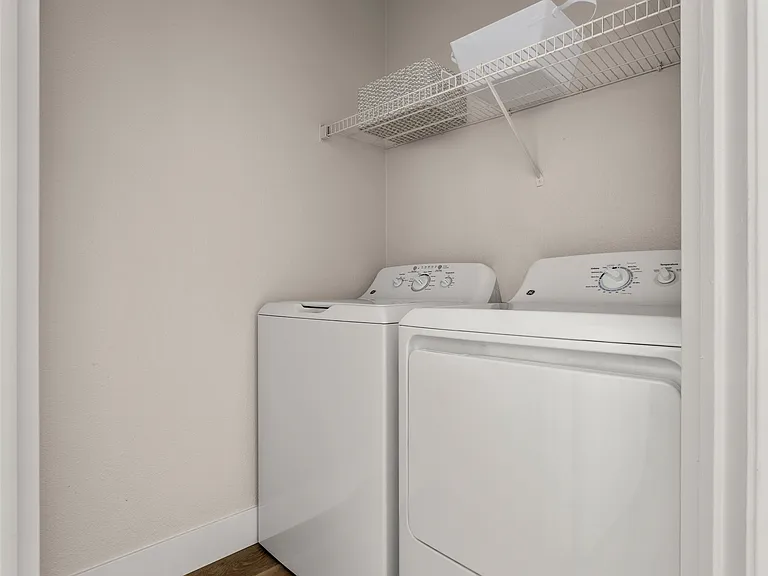Simplify your routine with a washer and dryer inside your home.