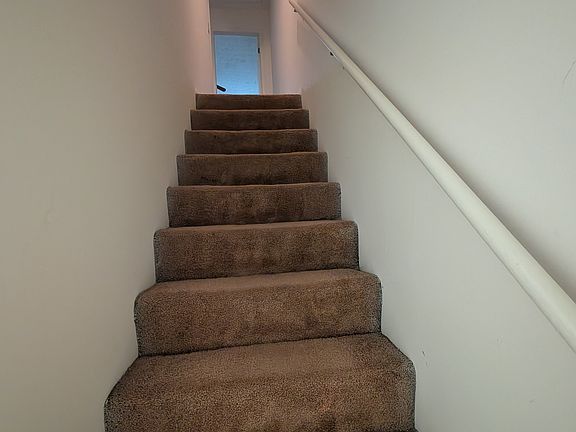 Stairs up to bedrooms