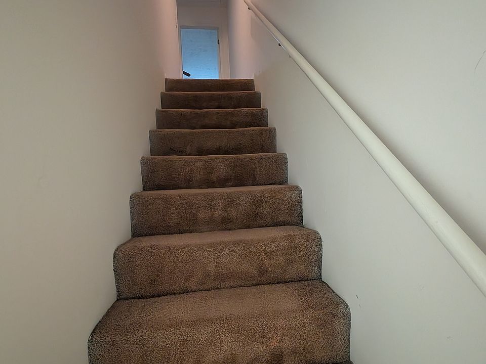 Stairs up to bedrooms