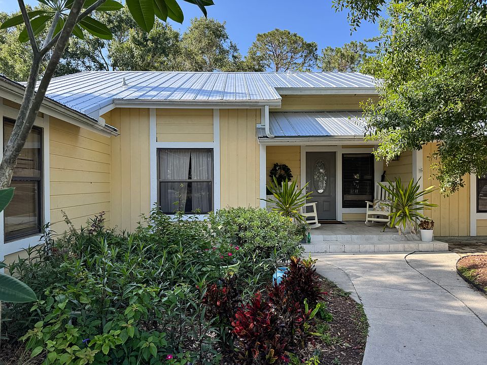 Front entrance. New metal roof