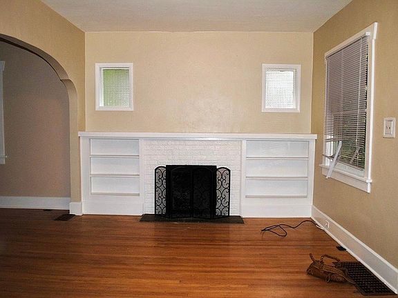 Fireplace w/ built in book case