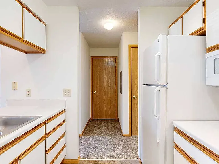 The Bonsai studio floor plan makes the most of every inch, with a galley-style kitchen that keeps essentials organized and easy to access.